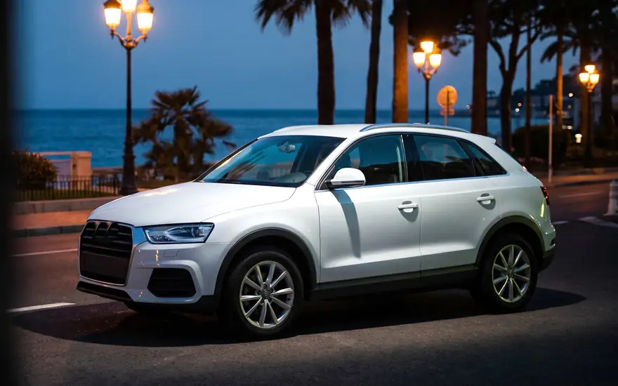 Audi Q3 on the Avenue Princesse Grace seafront, Monaco — representative rendering